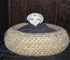 赤ん坊の額に十