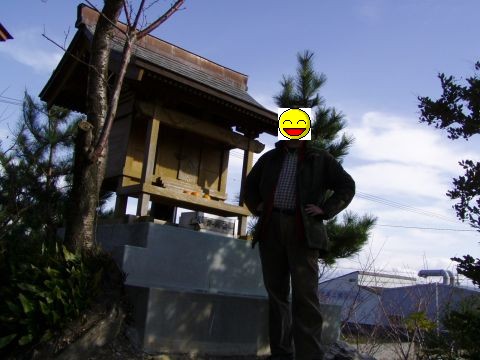 山頂に立つ筆者